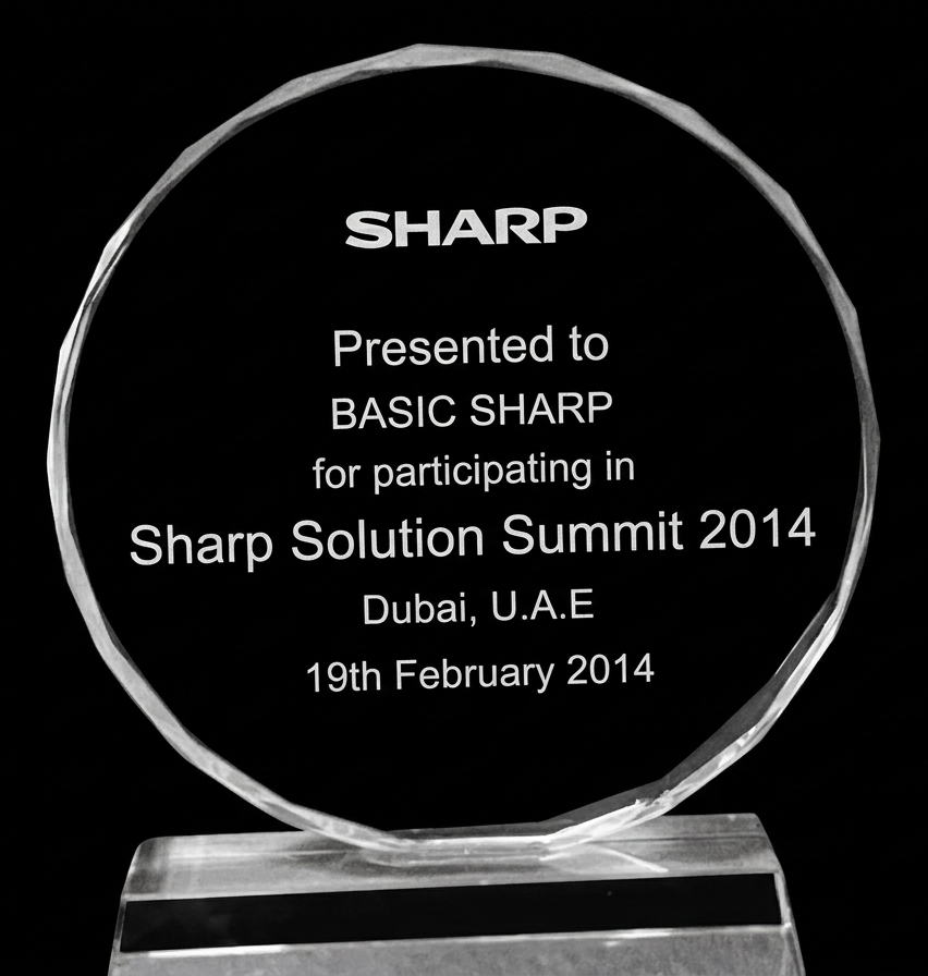 Sharp Solution Summit 2014 crystal plaque awarded to Basic Sharp Services